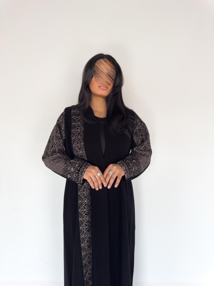 Manar abaya made of Indonesian ceramic fabric with full embroidered velvet inserts