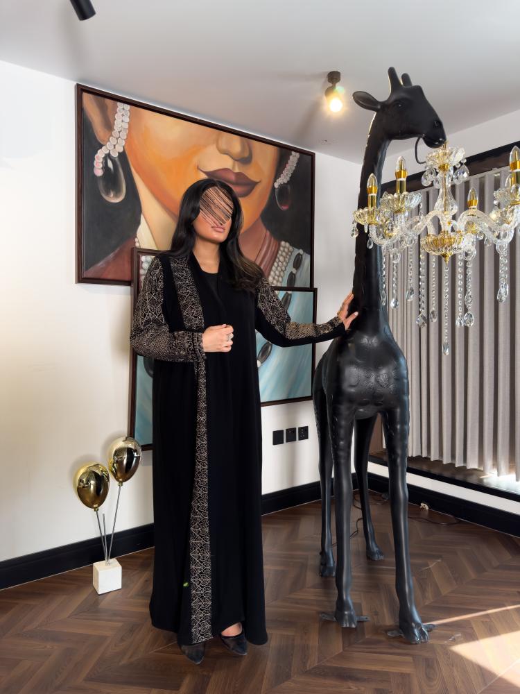 Manar abaya made of Indonesian ceramic fabric with full embroidered velvet inserts