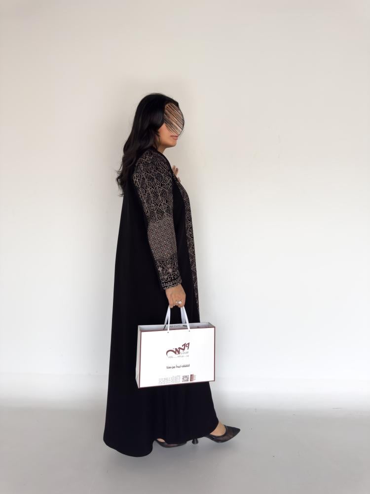 Manar abaya made of Indonesian ceramic fabric with full embroidered velvet inserts