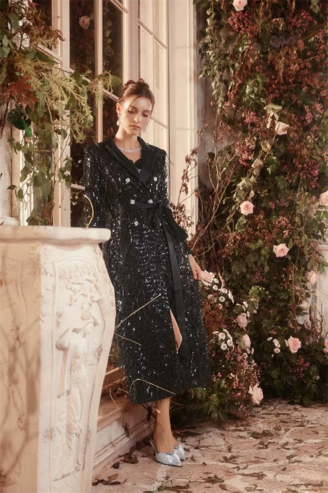 Black dress with sequins and feathers