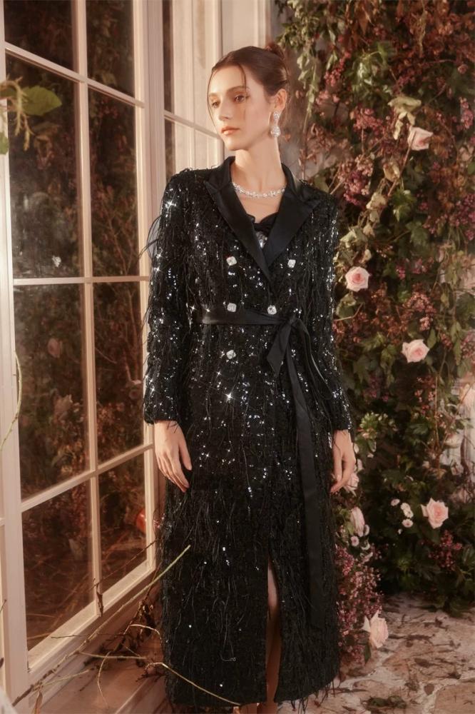 Black dress with sequins and feathers