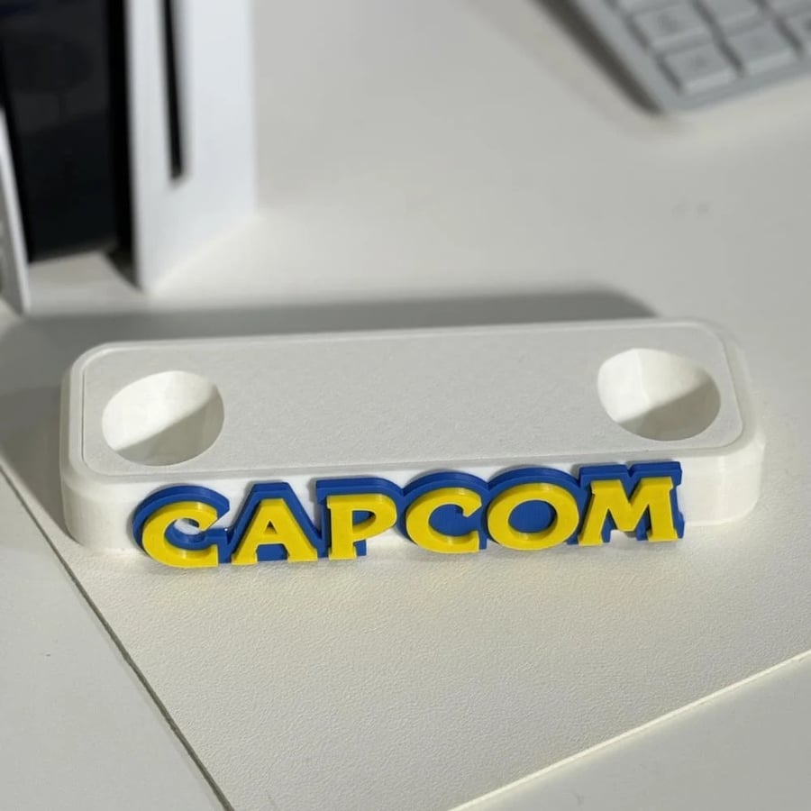 ستاند يد تحكم بلايستيشن 5 بشعار CAPCOM