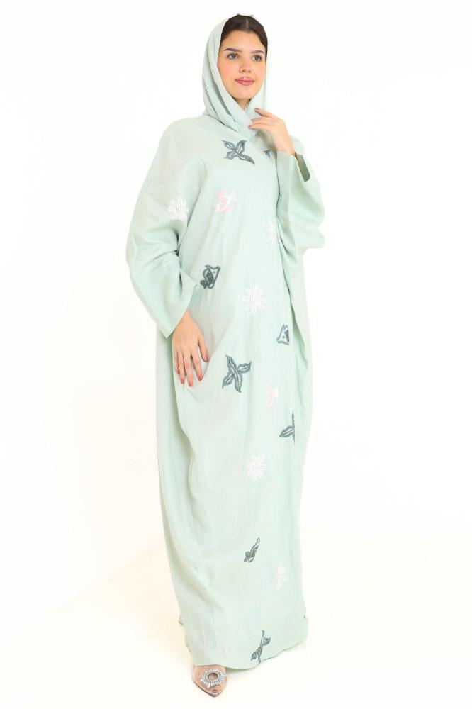 Green abaya embroidered with floral designs
