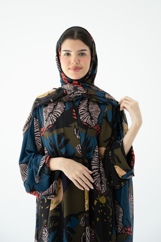 A dark blue floral abaya