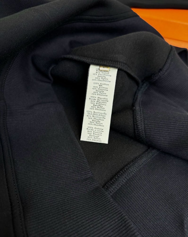 سويت شيرت / بلوفر رجالي فاخر بتفاصيل السحاب الجانبي من "هيرميس" (Hermès)
