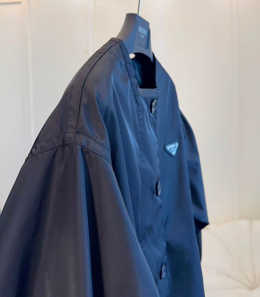 جاكيت نسائي فاخر بتصميم عالي الرقبة من برادا (Prada Nylon Zip & Button Jacket)