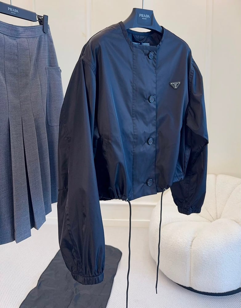 جاكيت نسائي فاخر بتصميم عالي الرقبة من برادا (Prada Nylon Zip & Button Jacket)