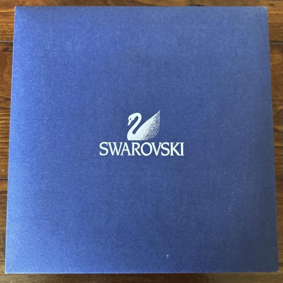 The pearl necklace, Swarovski brand, from the 1990s.