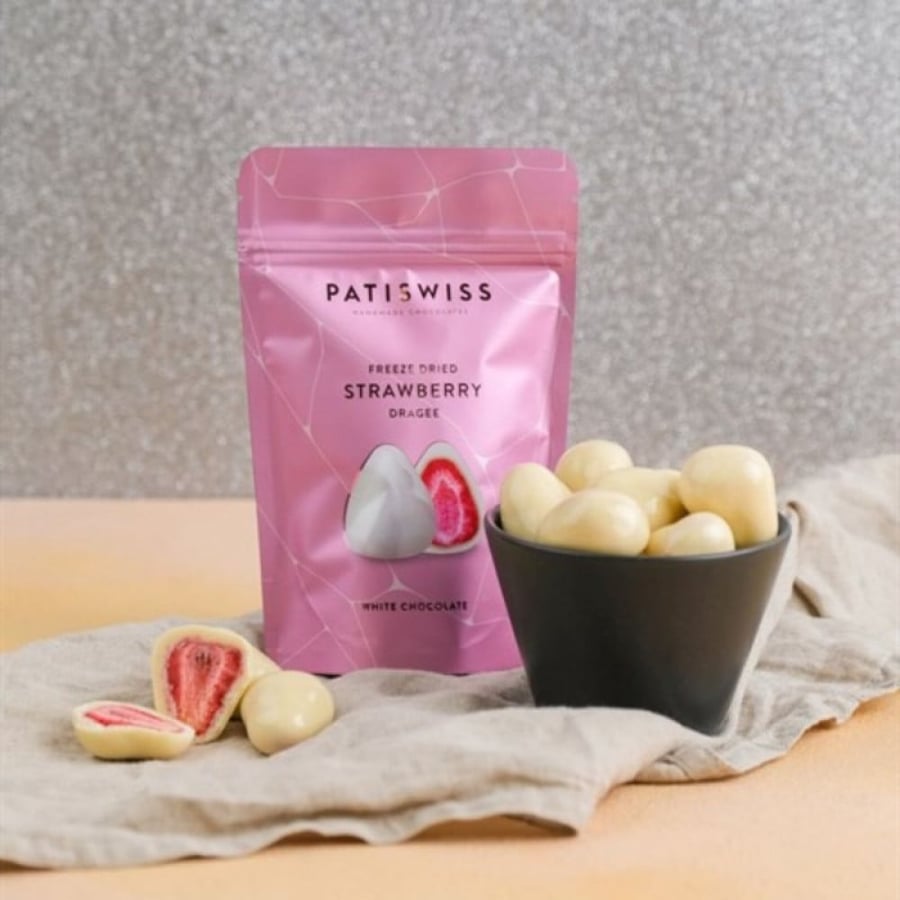 Dried strawberry pieces coated with white chocolate from Baty Swiss