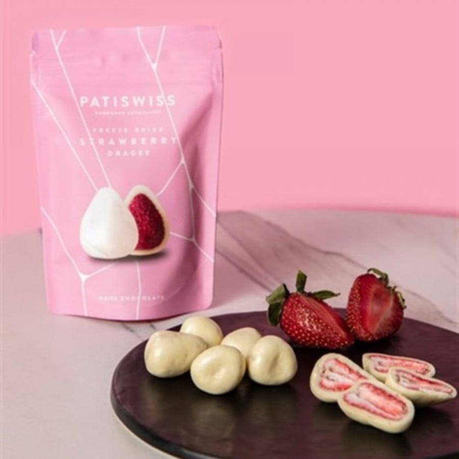 Dried strawberry pieces coated with white chocolate from Baty Swiss