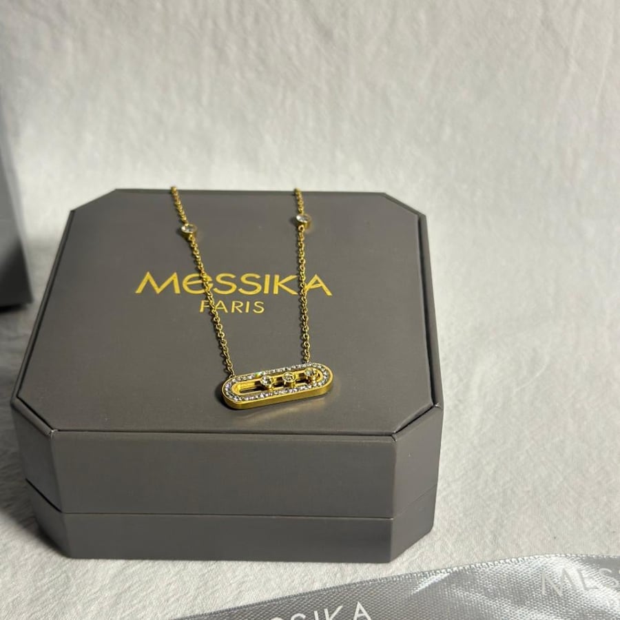 Gold M necklace