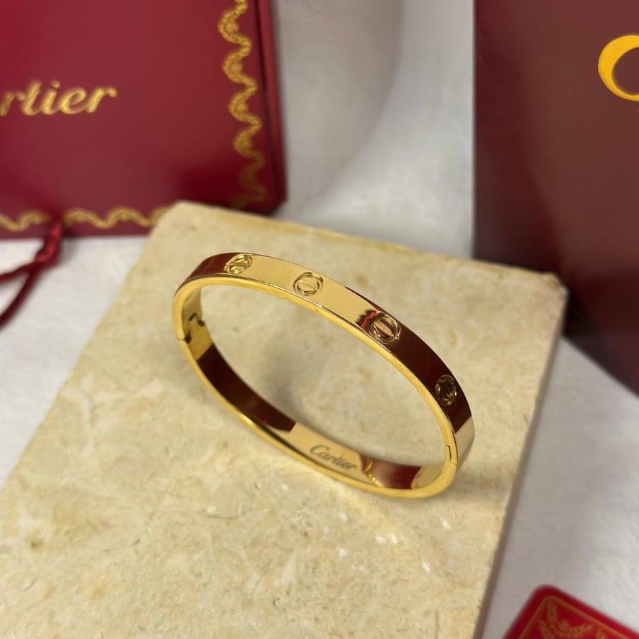 Gold C bracelet