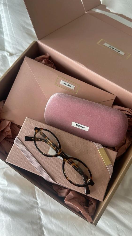 Miu Miu Tiger/Black sunglasses