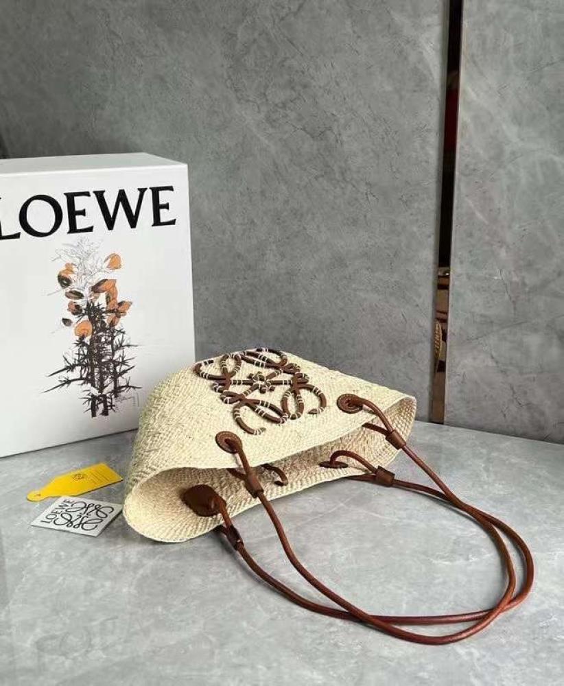 small Anagram Basket bag in it’s a palm and calfskins Tan