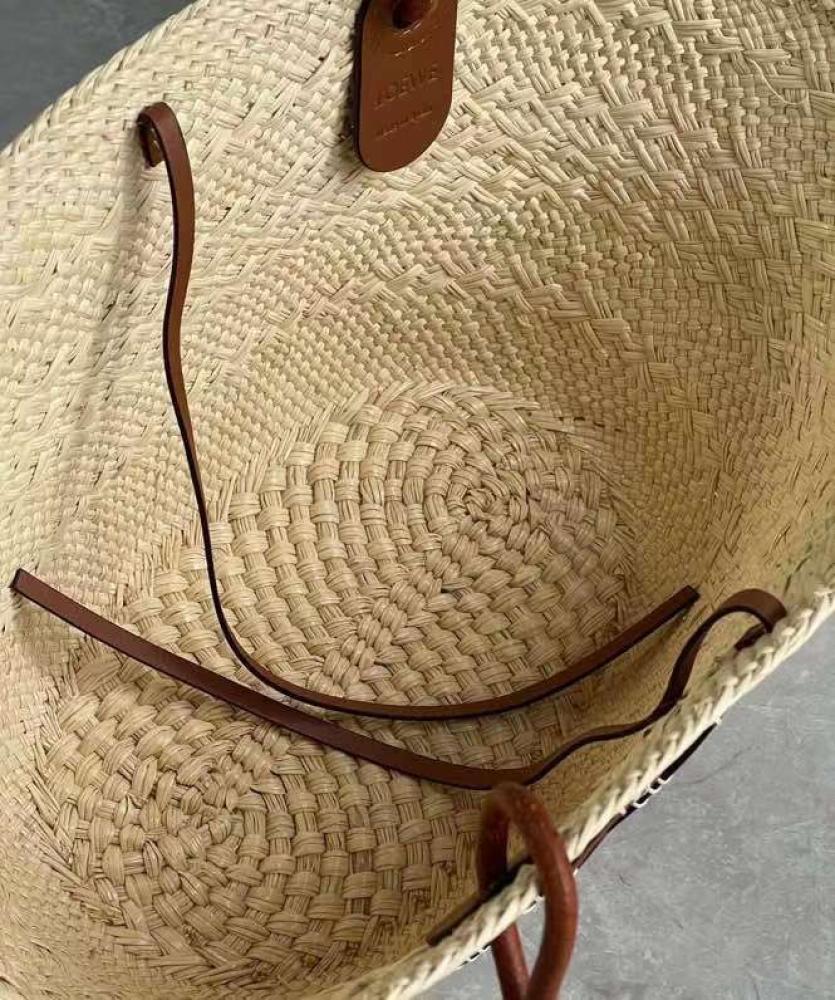 small Anagram Basket bag in it’s a palm and calfskins Tan