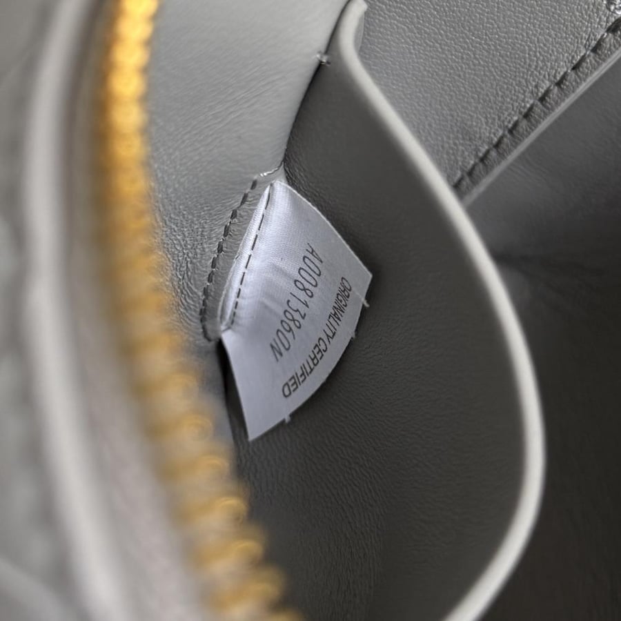 Concert Pouch in Intrecciato Leather
