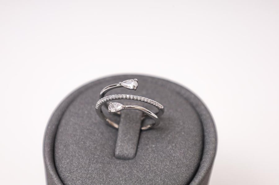 Silver ring with three layers encrusted with crystal