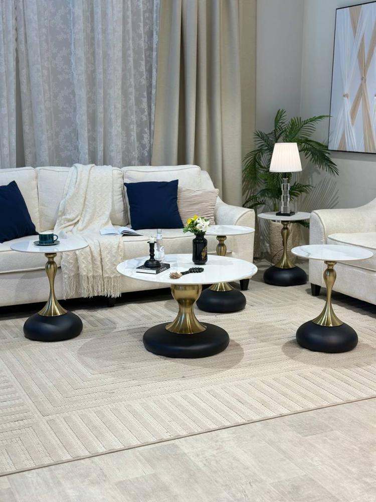 7-piece modern table set with gold steel bases in several colors.