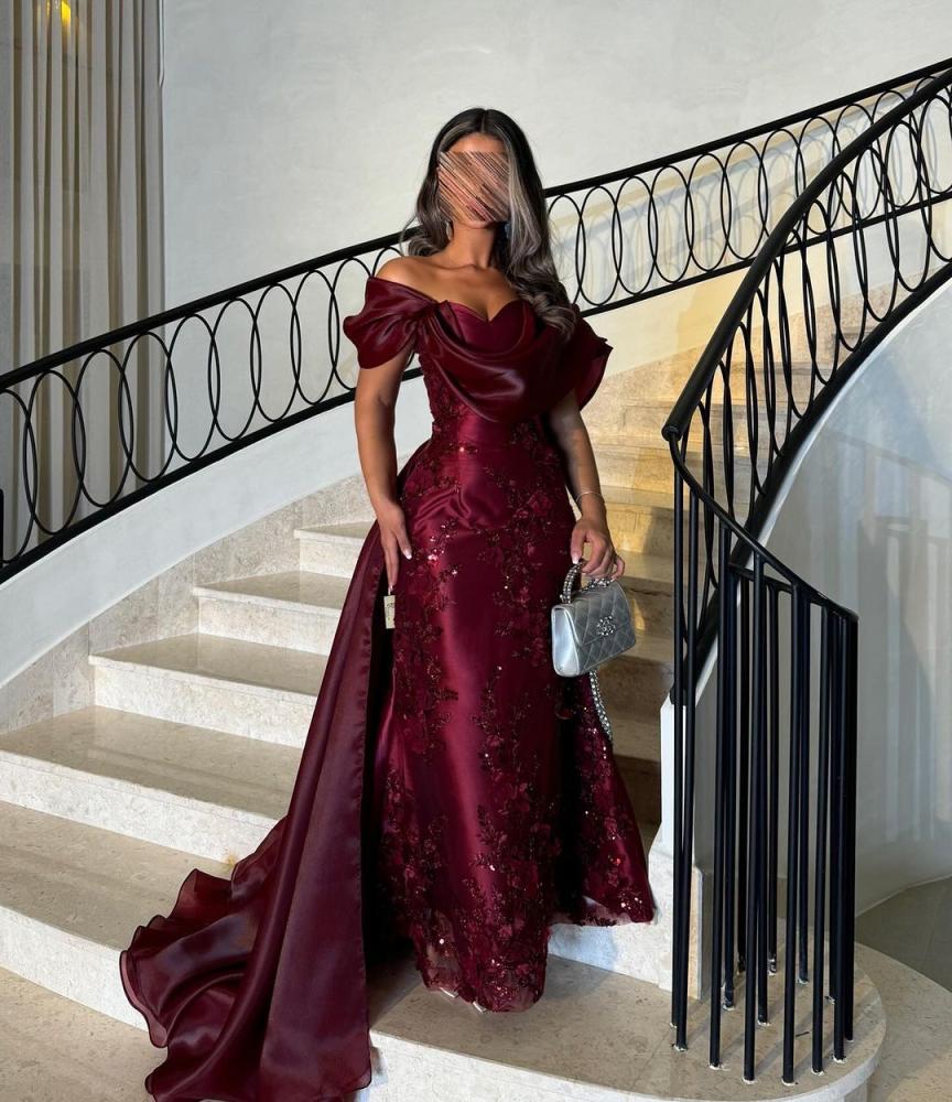 Evening dress with prominent floral and organza