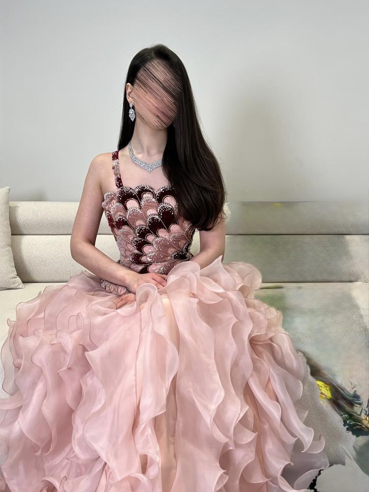 Evening dress with embroidered bodice, beaded decoration, and jazar skirt