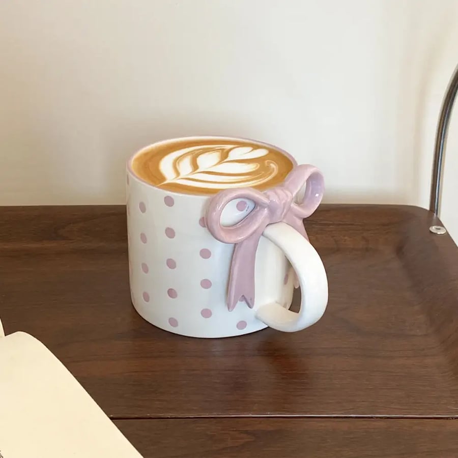 كوب سيراميك قلب بقوس بمقبض تصميم مميز