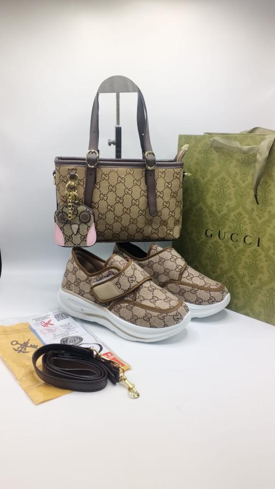 طقم Gucci