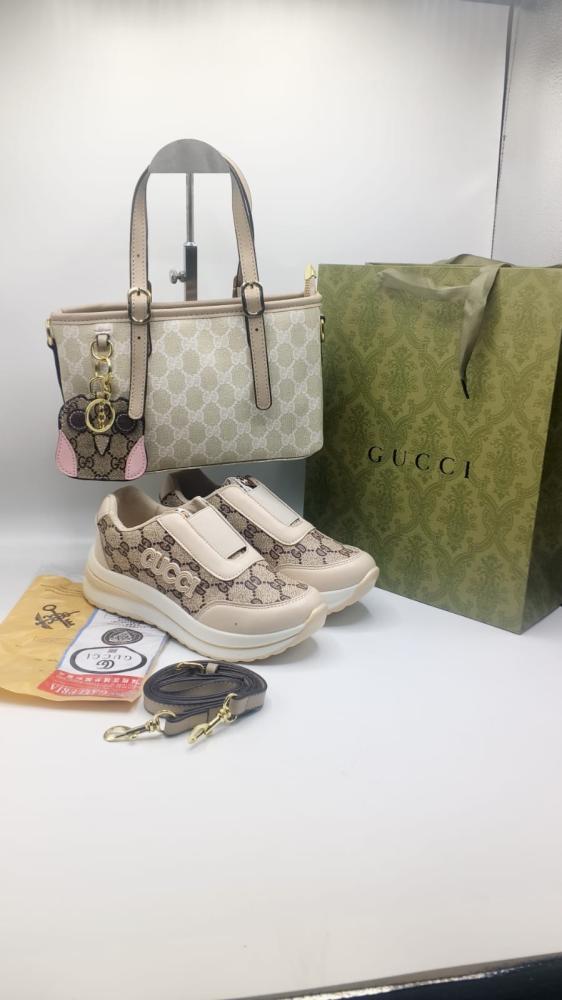 طقم Gucci