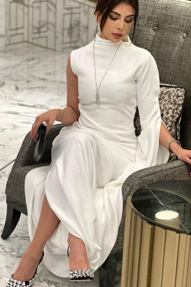 Elegant evening dress, white color