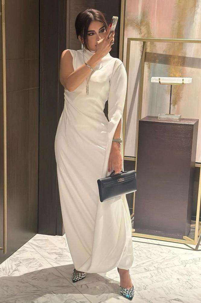 Elegant evening dress, white color