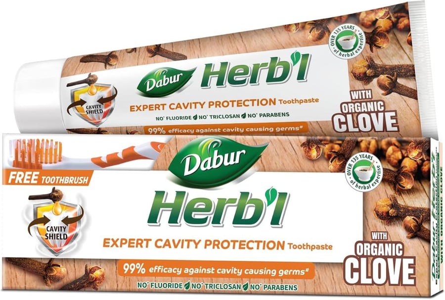 Dabur Herbal Cavity Protection Clove Toothpaste (150g + Toothbrush) | Enriched with Clove | Natural Toothpaste For Cavity Free Strong Teeth
