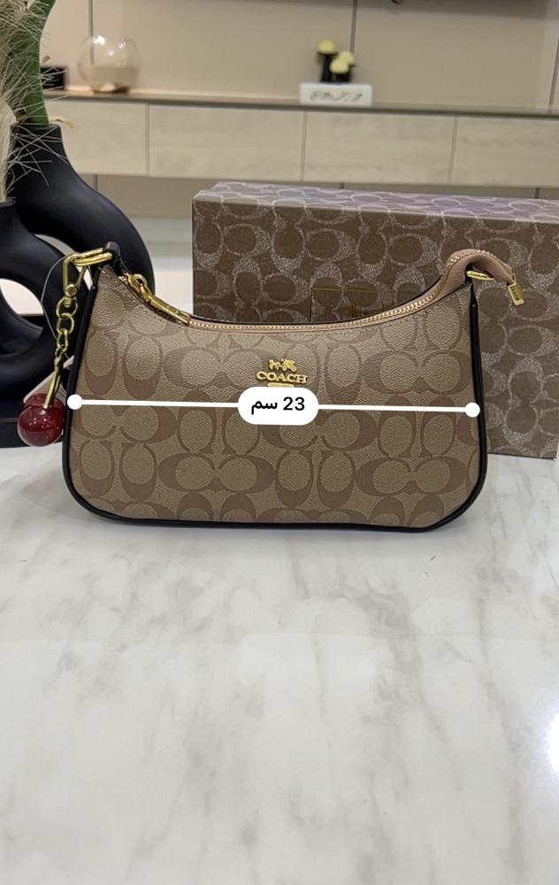 شنطة كوتش _ بني مع جملي