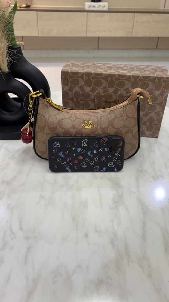 شنطة كوتش _ بني مع جملي