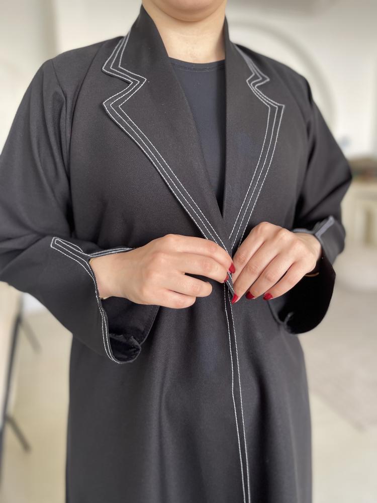 A precisely tailored blazer in white