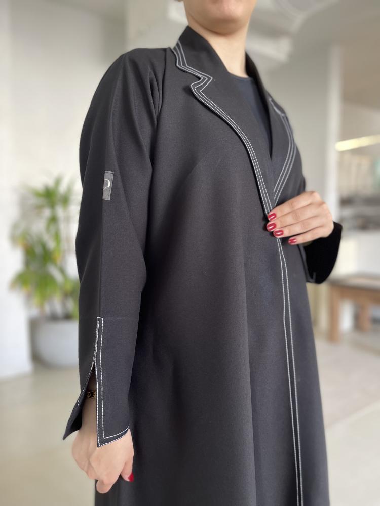 A precisely tailored blazer in white