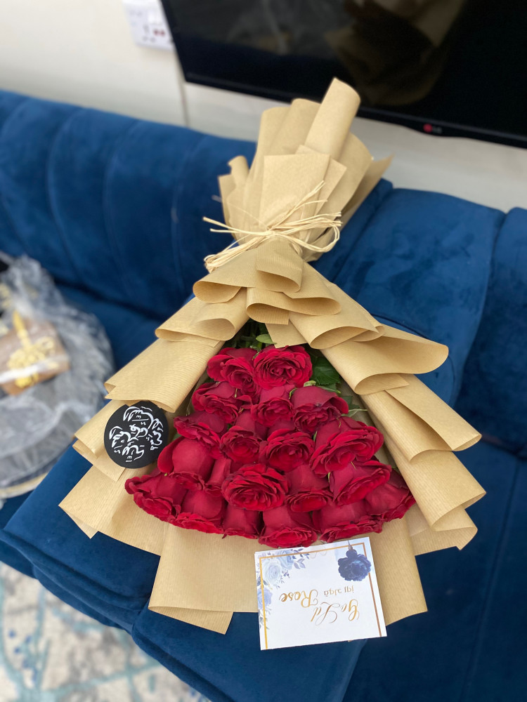 باقه ورد الاحمر تغليف ورقي