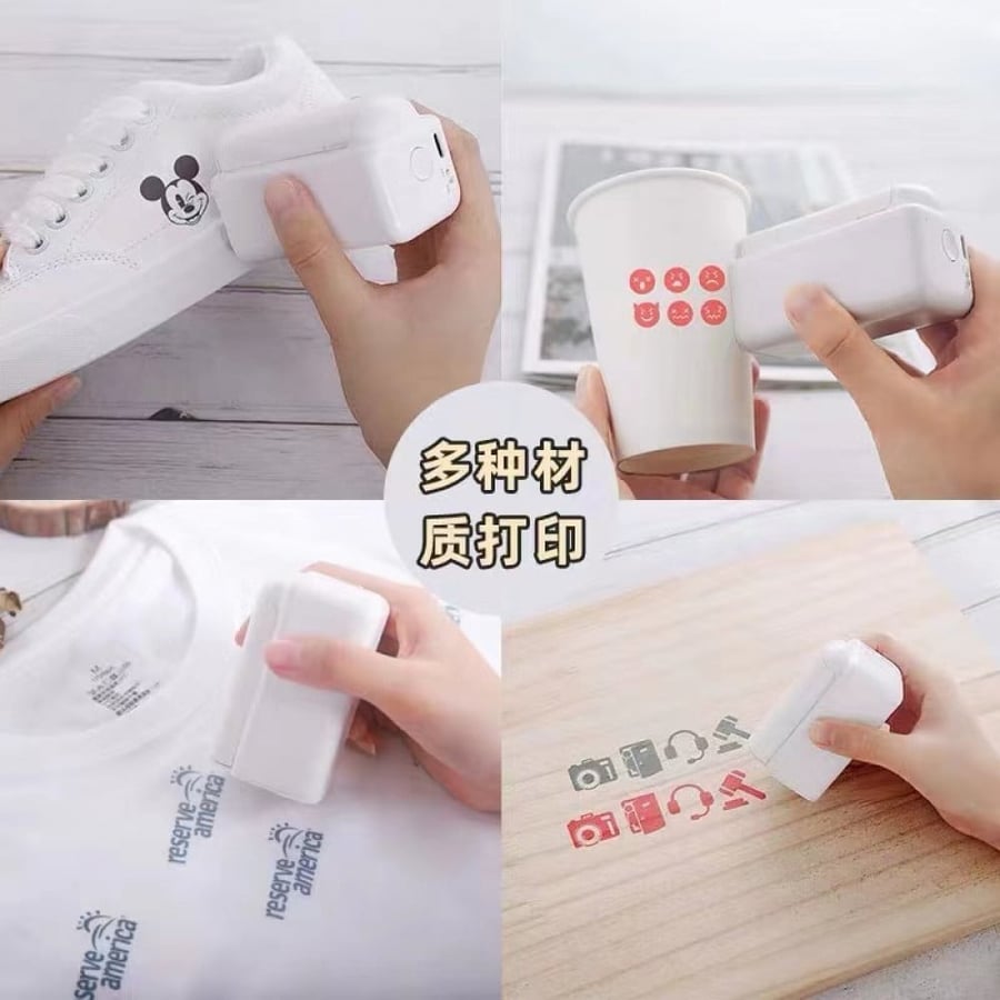 Hand-held printer with ink cartridge - طابعة صغيرة مع حبر