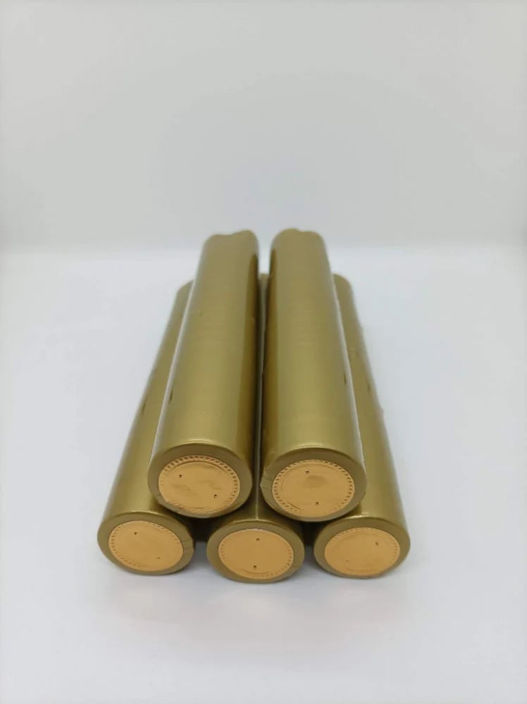 بلاستيك حراري (PVC) ذهبي  لقفل علب الزجاج " شرنك"(100 حبه) مع شريط فتح