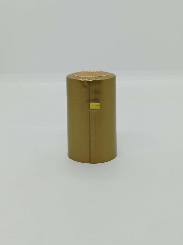 بلاستيك حراري (PVC) ذهبي  لقفل علب الزجاج " شرنك"(100 حبه) مع شريط فتح
