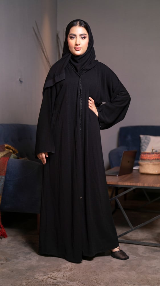 Black abaya at a soft cost