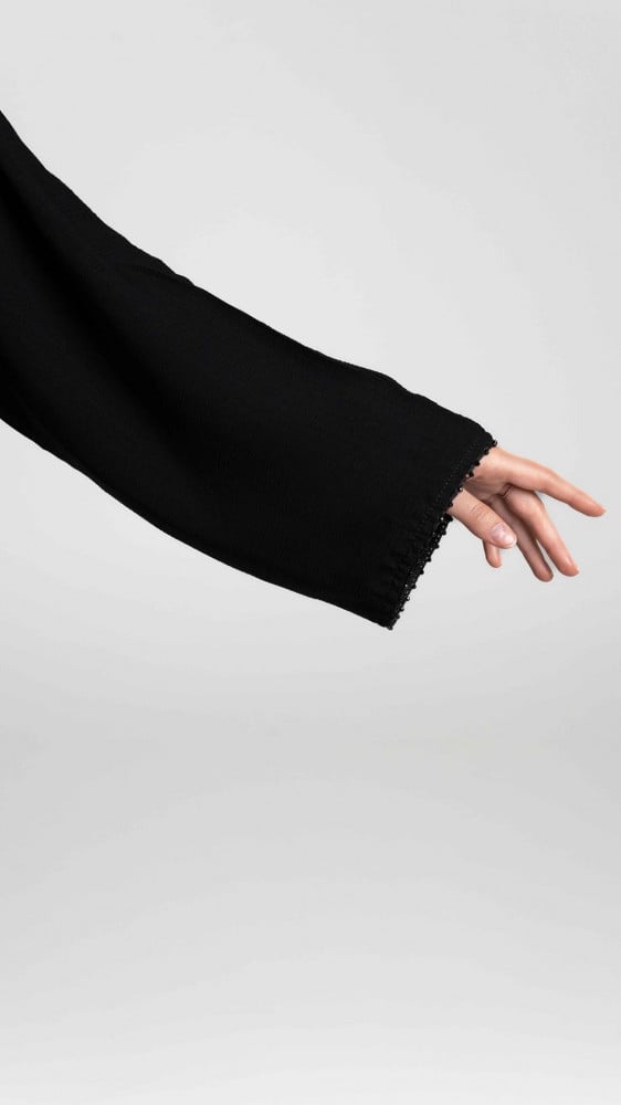 Black abaya at a soft cost
