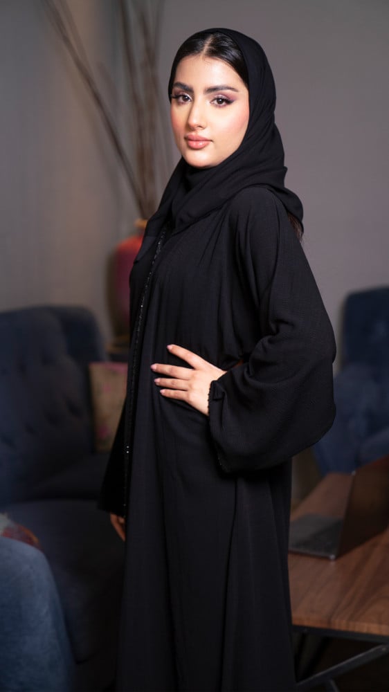 Black abaya at a soft cost