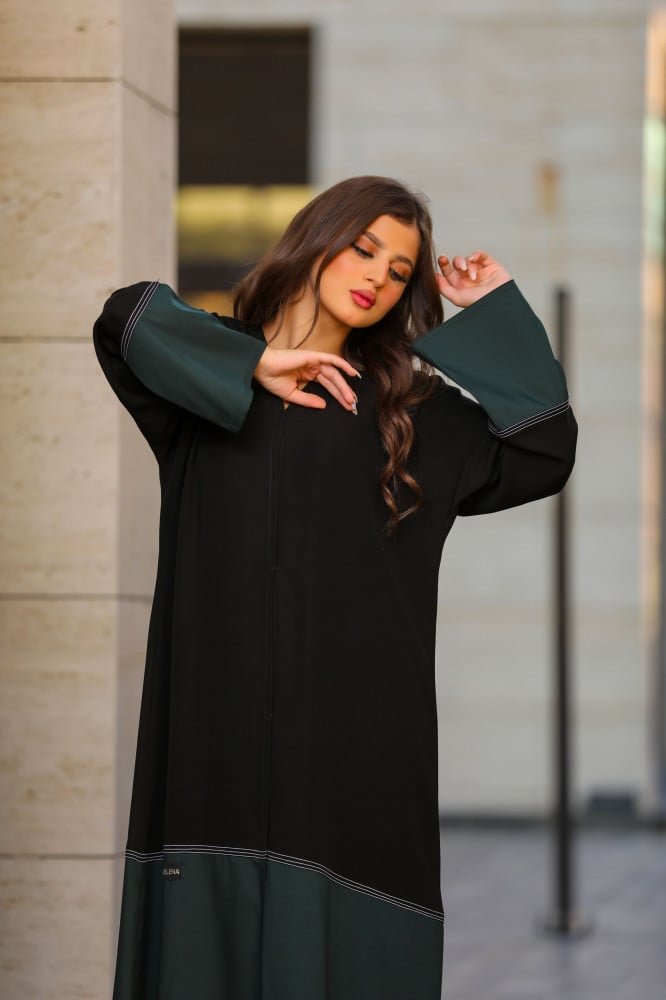 عباية مزينه بخامة التفتا الزيتي
