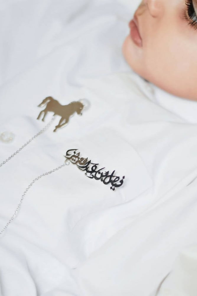 Horse brooch with the name