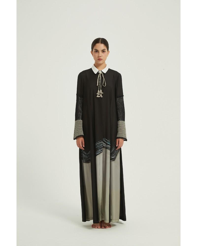 Waved beige in black abaya with corchet sleeve