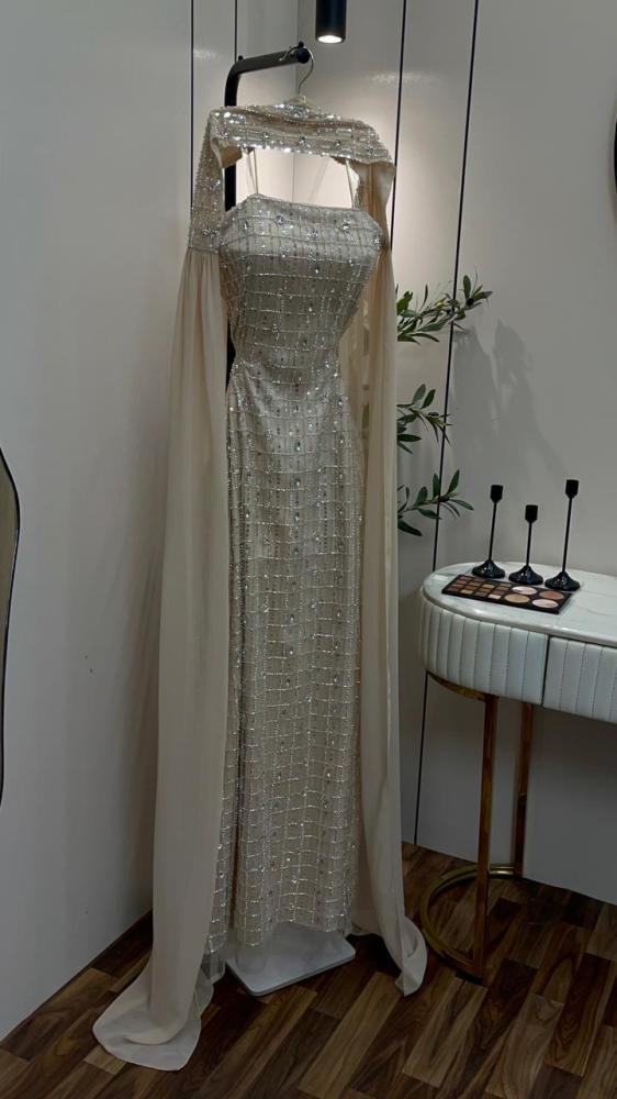 Tulle dress embroidered with beads