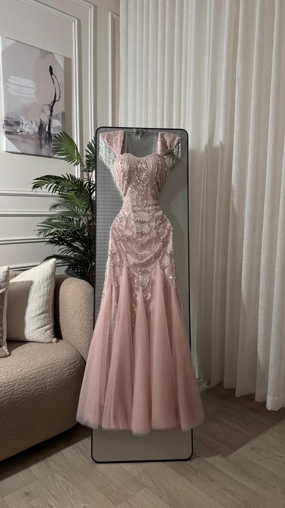 Dress with padded design, beads, and chains