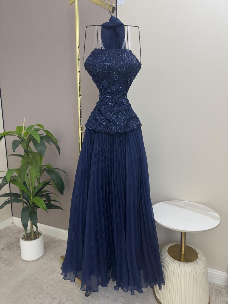 Dress decorated with beads and rhinestones