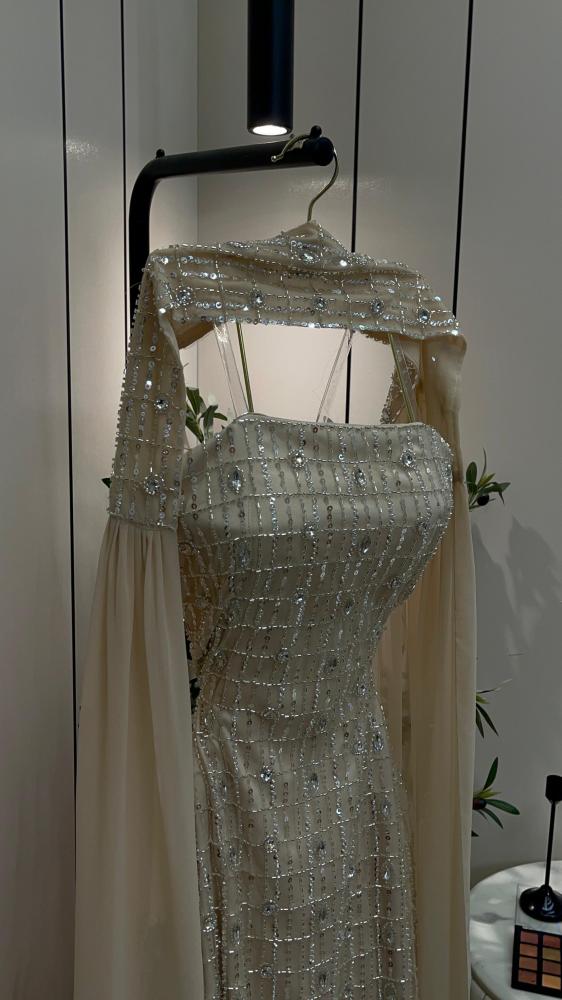 Tulle dress embroidered with beads