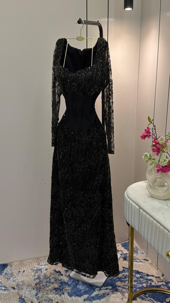 Tulle dress embroidered with beads