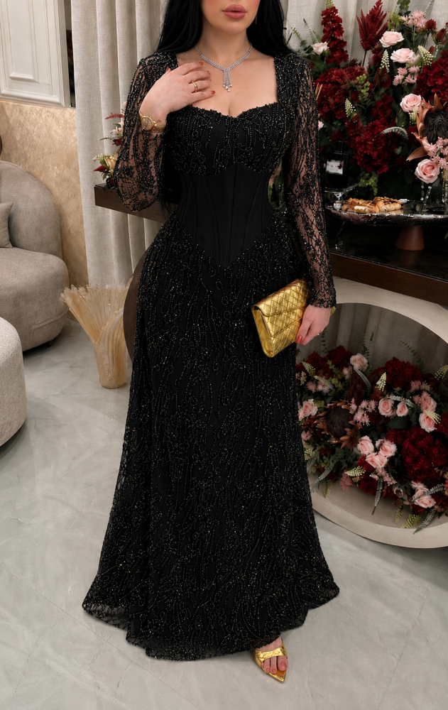 Tulle dress embroidered with beads